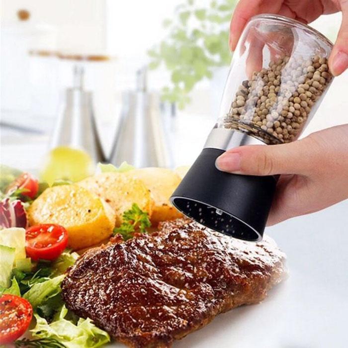 Dụng cụ đựng và xay tiêu cầm tay đa năng