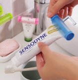 2pc Useful Plastic Rolling Tube Squeezer Toothpaste Easy Dispenser Bathroom Holder Pink - intl