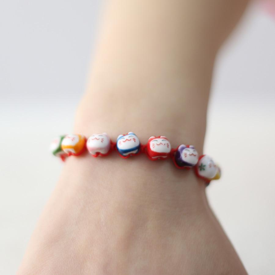 Vòng chỉ đỏ mèo may mắn mèo thần tài (9 mèo)