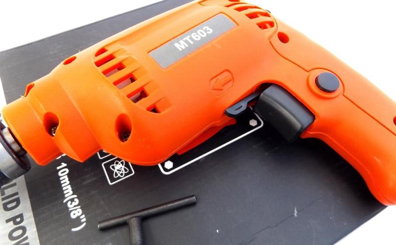 Máy khoan 450W MT603