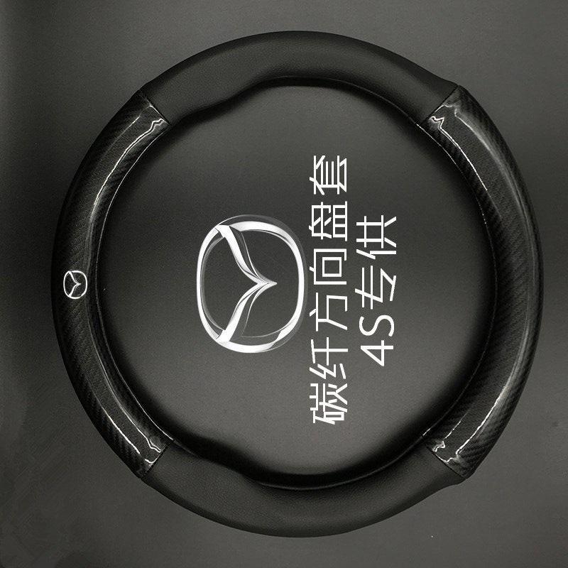 [Hỗ trợ lắp đặt khách Hà Nội] Bọc vô lăng cacbon biểu tượng Mazda