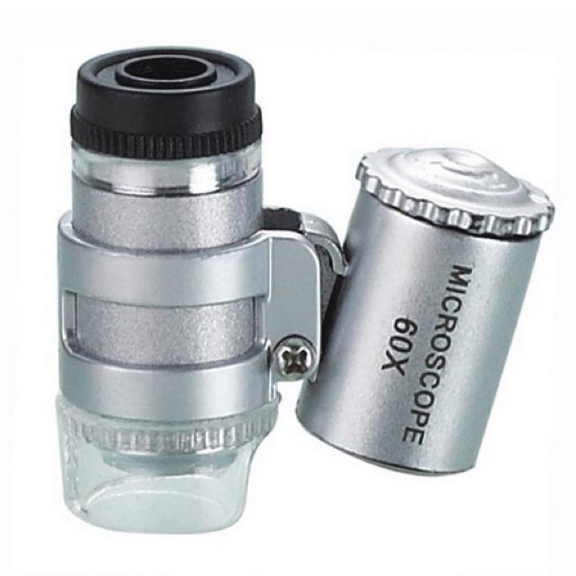 60x zoom. It is a magnifying glass. The small type has a portable LED light, which is used to see small objects, texture fabrics, UV lamp casing to check. Th117