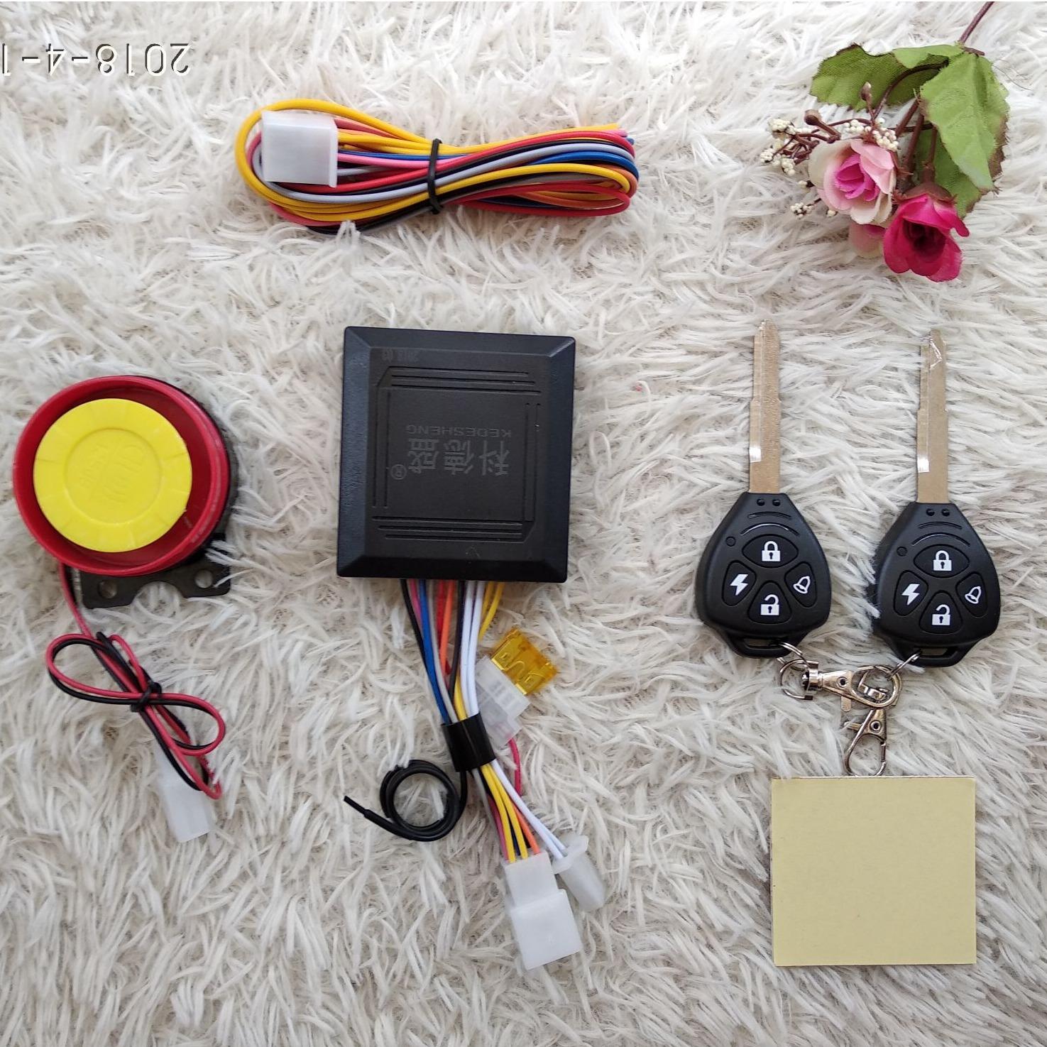 khóa chống trộm xe máy 4 nút -  remote liền chìa ( phôi chìa yamaha )