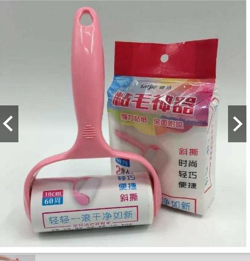 cây lăn bụi quần áo tặng kèm 2 lõi