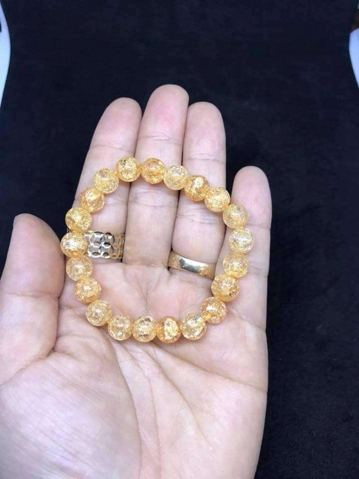 Vòng tay đá bọt tuyết vàng 8ly