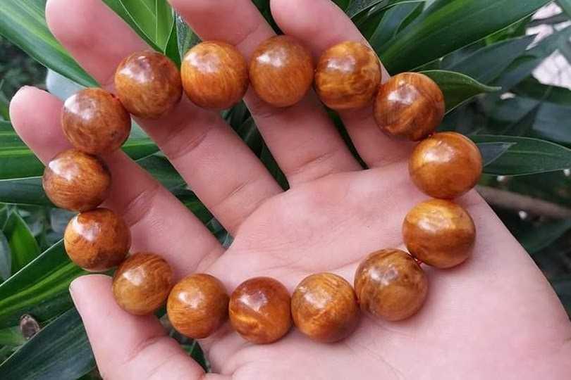 Vòng deo tay gỗ Nu Huyết Long 14ly
