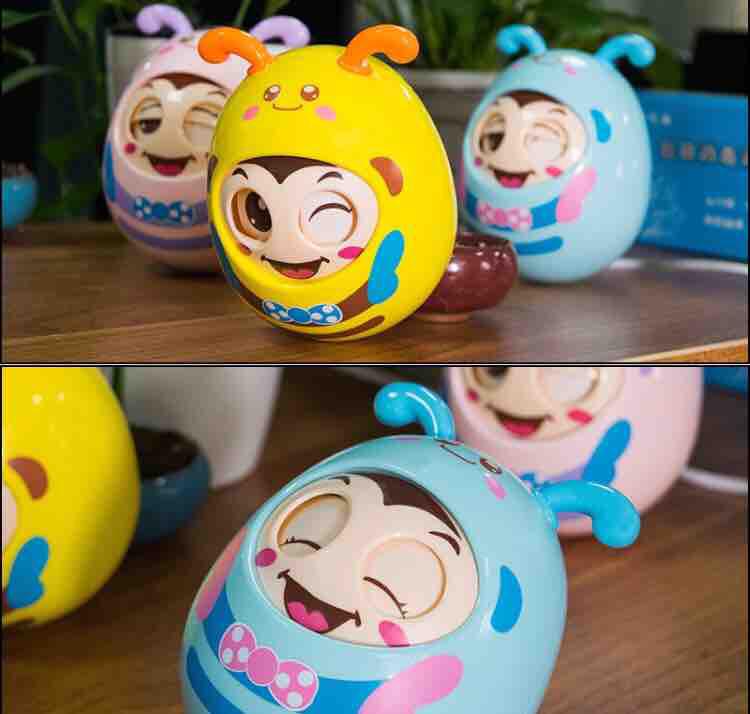 Con lật đật phát nhạc chớp mắt, gặm nướu cho bé