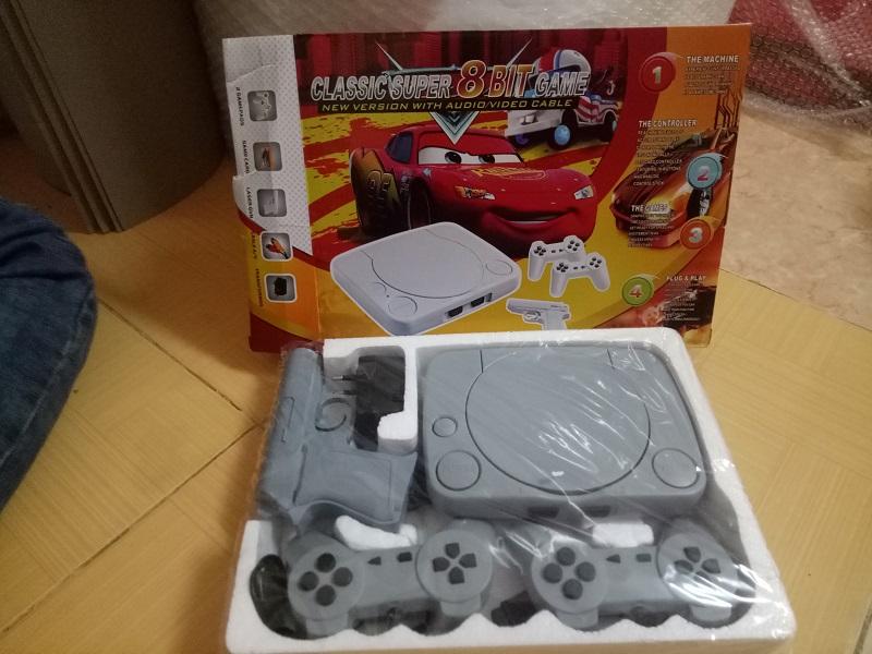 Máy chơi game 4 nút  ( được cài  game trong máy )