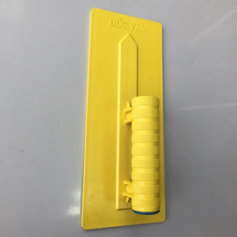 Bàn xoa nhựa vàng