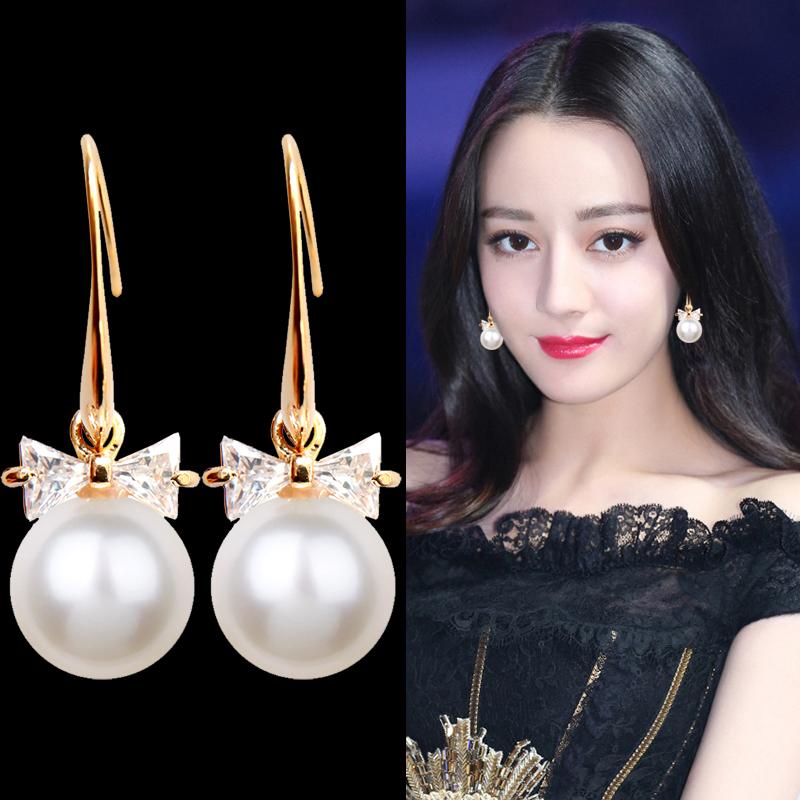 Bông tai nơ đá đính hạt giả ngọc trai