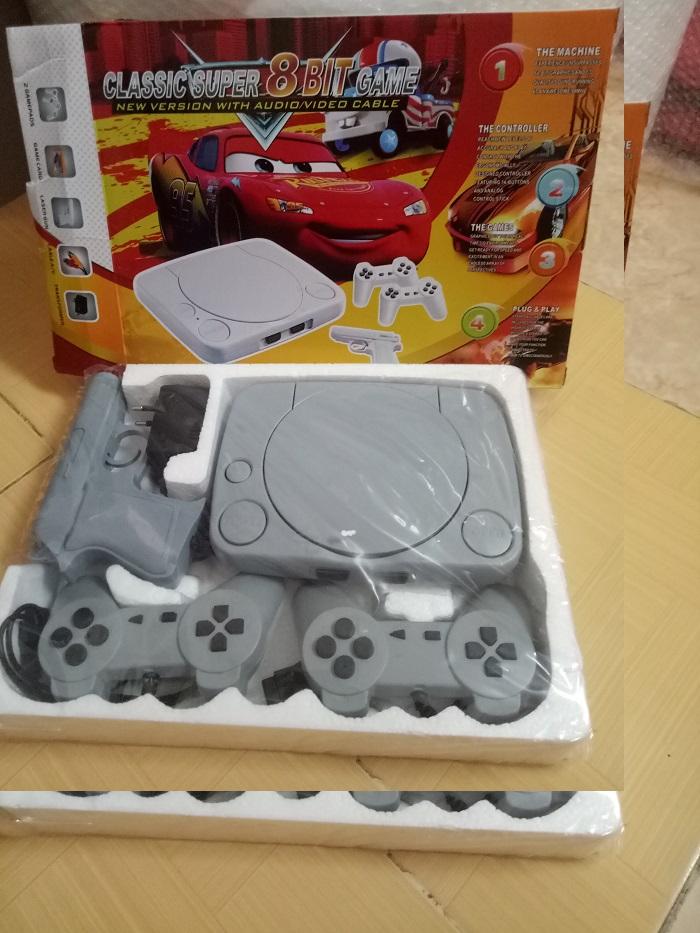 Máy chơi game 4 nút  ( được cài  game trong máy )