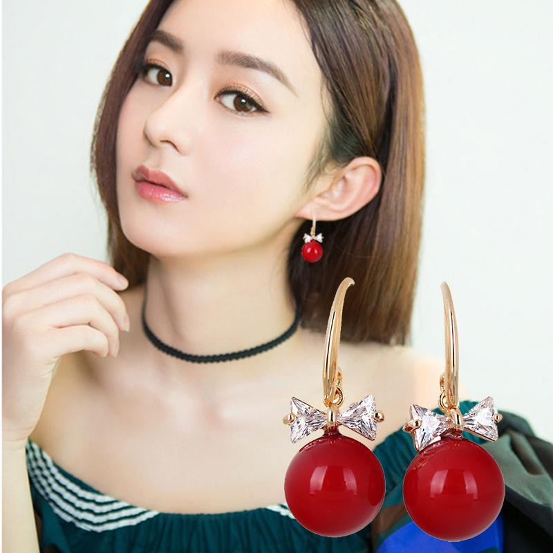 Bông tai nơ đá đính hạt giả ngọc trai