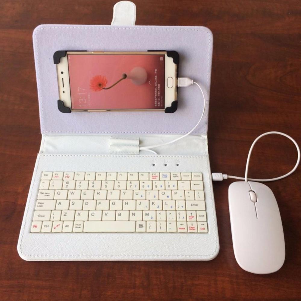 Bạn muốn sở hữu một bàn phím có chuột để dễ dàng làm việc và giải trí trên điện thoại hoặc máy tính bảng? Đừng bỏ qua hình ảnh này! Nó sẽ giúp bạn có trải nghiệm tuyệt vời với các thiết bị di động của mình.