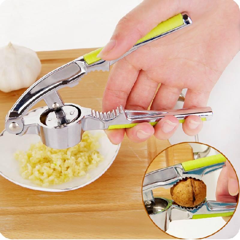 Dụng cụ ép tỏi inox