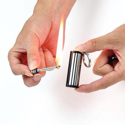 Quẹt diêm xăng móc khoá hình trụ