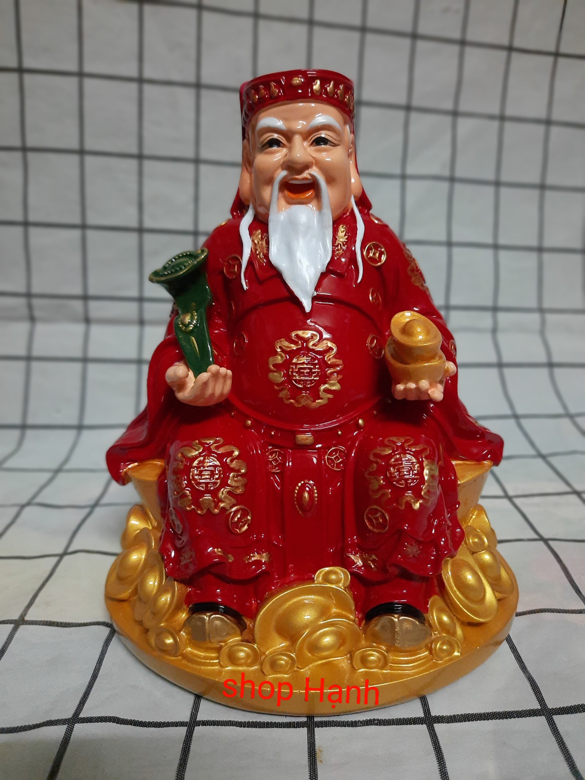 Ông Địa Thần Tài ngồi thỏi vàng đế tròn