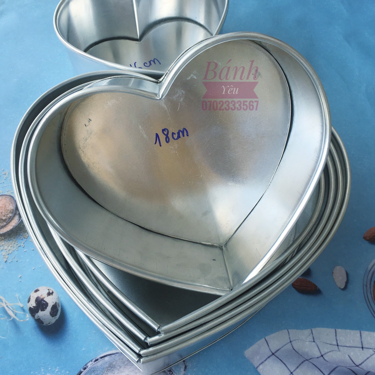 Khuôn nhôm tim đế rời làm khuôn bánh