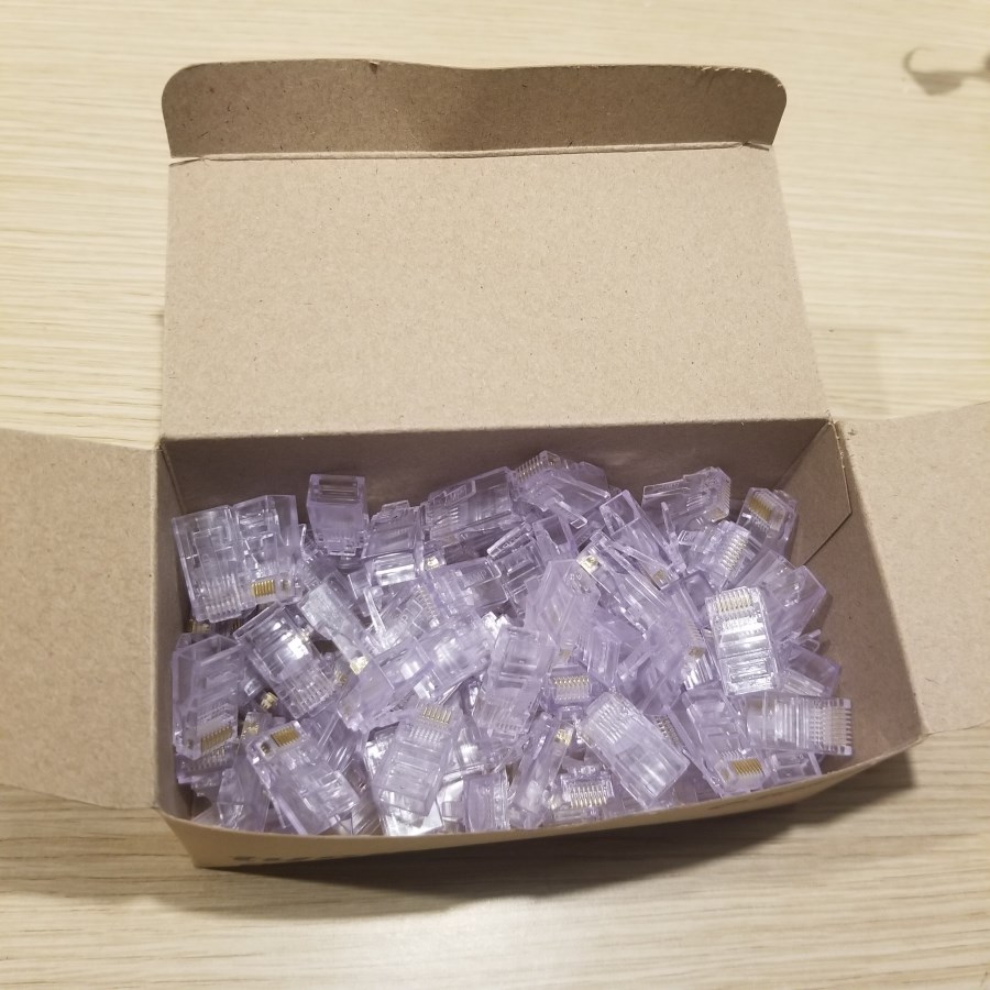 Hộp 100 đầu mạng RJ45 nhựa AMPIX (Trắng)