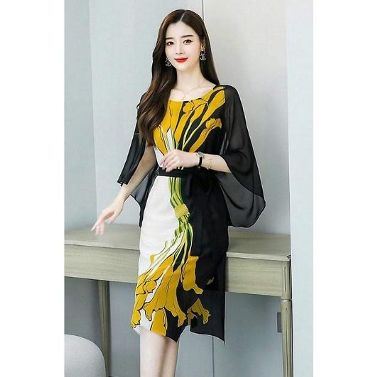 ĐẦM SUÔNG HOA RUM VÀNG THẮT NƠ EO