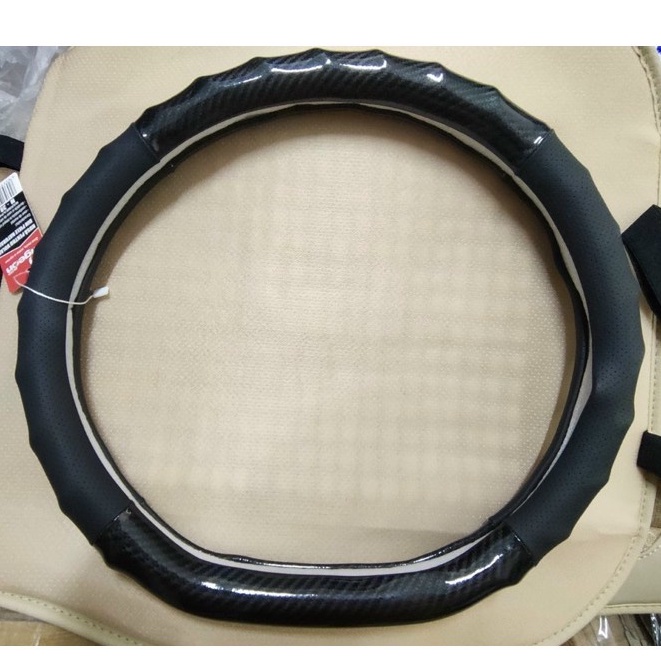 Hcm - bọc vô lăng chữ d, bọc vô lăng carbon chữ d cho xe kia seltos, kia sonet, almera, xl7 ..mẫu d xoắn