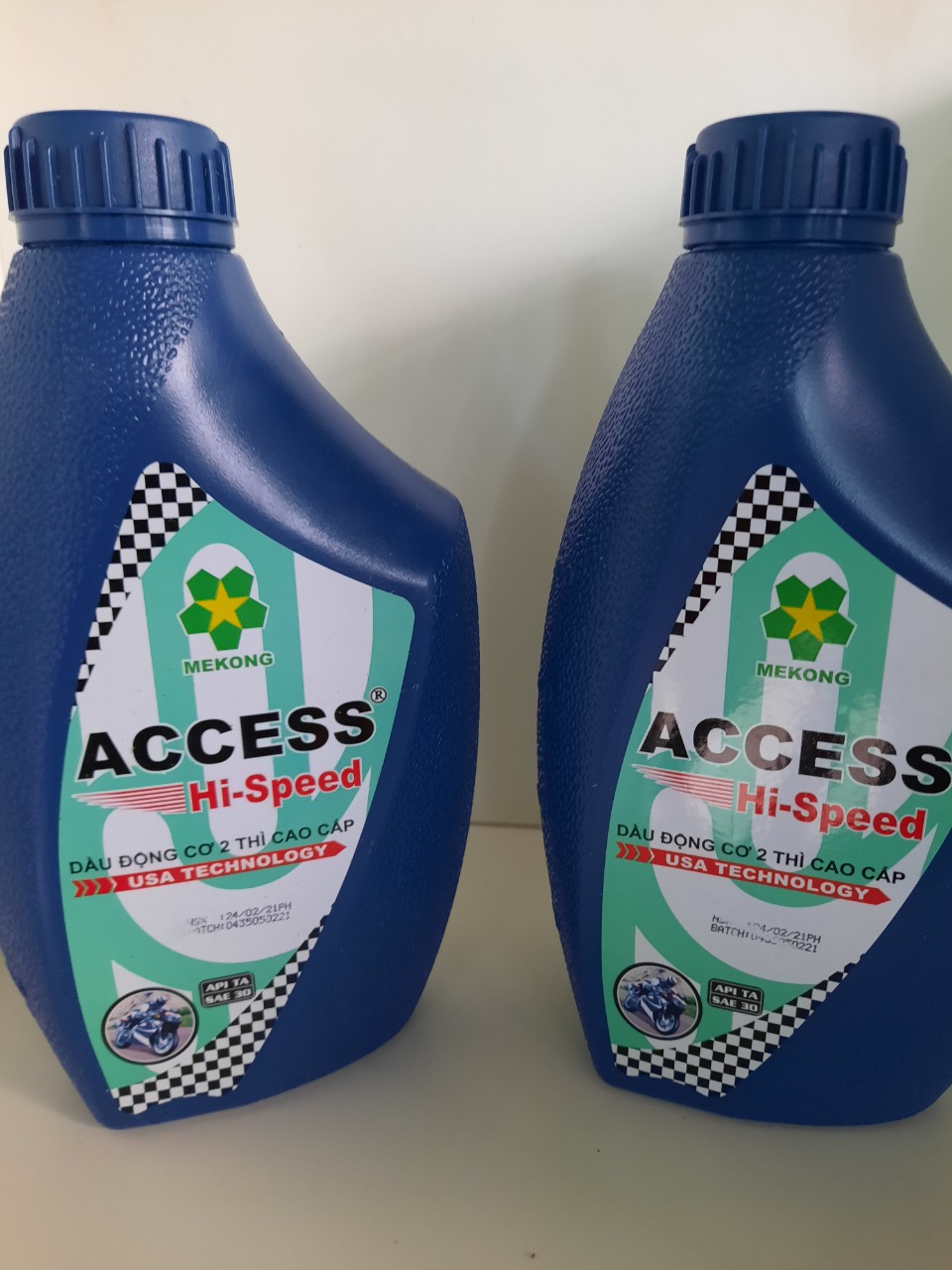 Siêu khuyến mãi - lốc 2 chai Dầu nhớt 2 thì Access 2T-TA (xe gắn máy 2T và máy cắt cỏ)