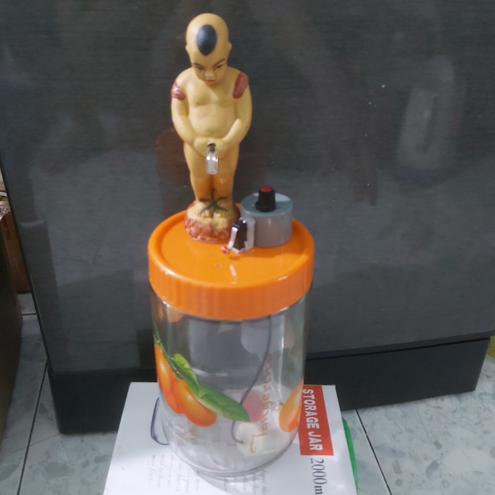 Bình rót rượuu chú tiểu thủy tinh