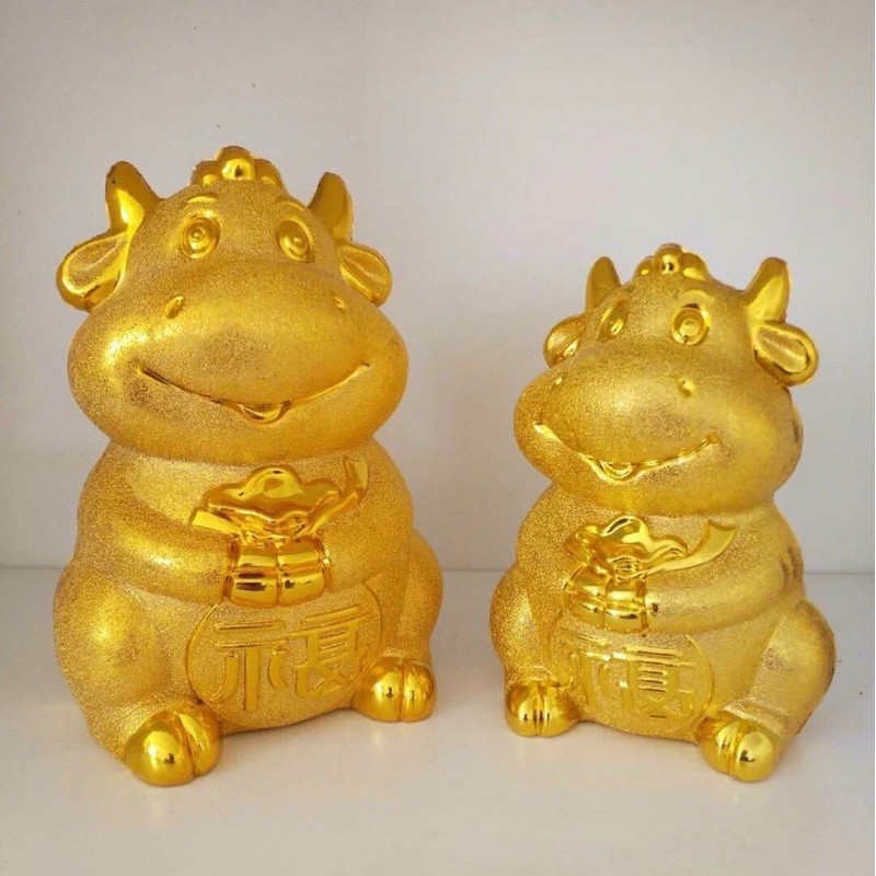 Trâu vàng đút tiền tiết kiệm
