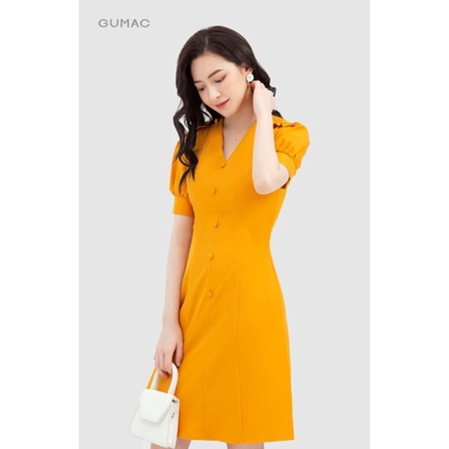 Đầm cổ V phối nút GUMAC
