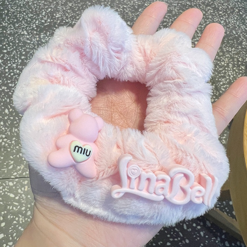 Cột tóc lông gấu hồng cute