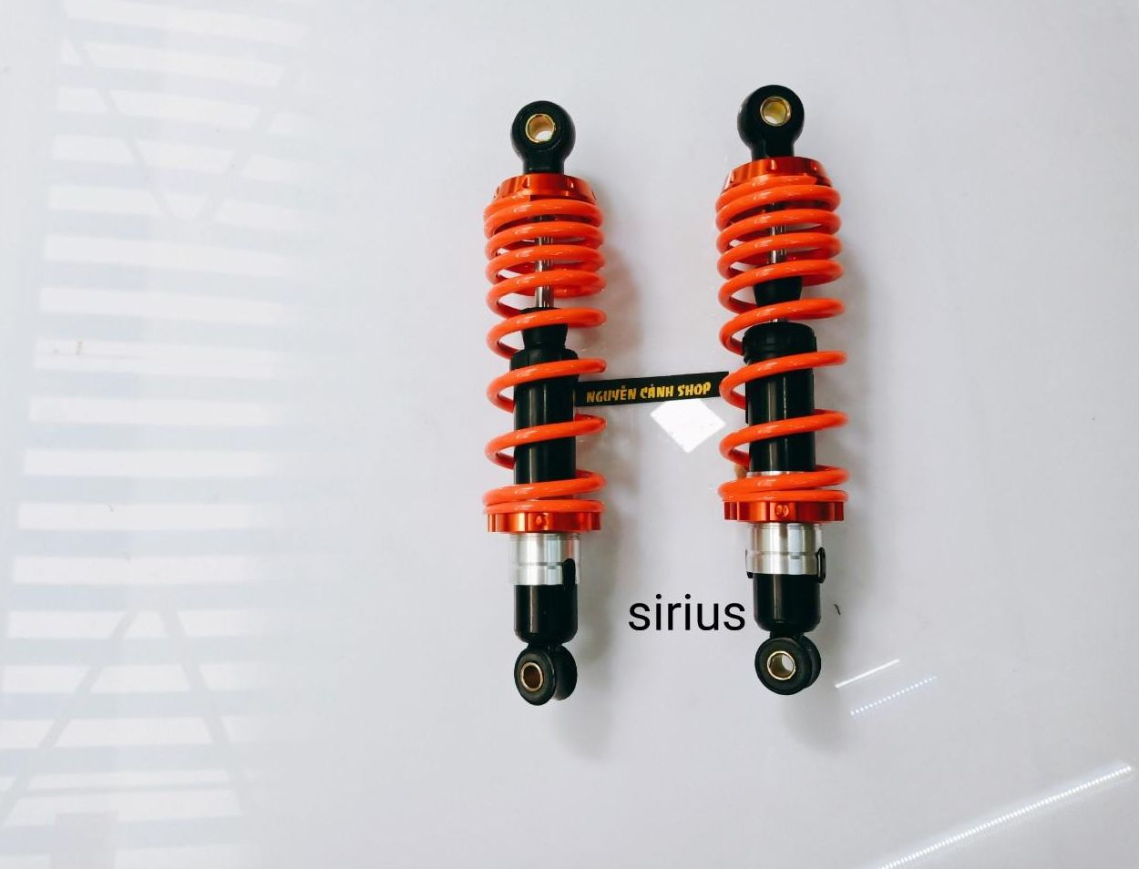 phuộc sau sirius racing boy màu đỏ 1 cặp