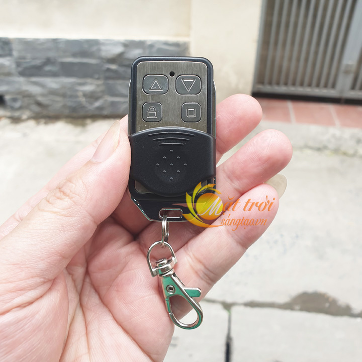 Điều khiển cửa cuốn mã gạt tần số 433Mhz