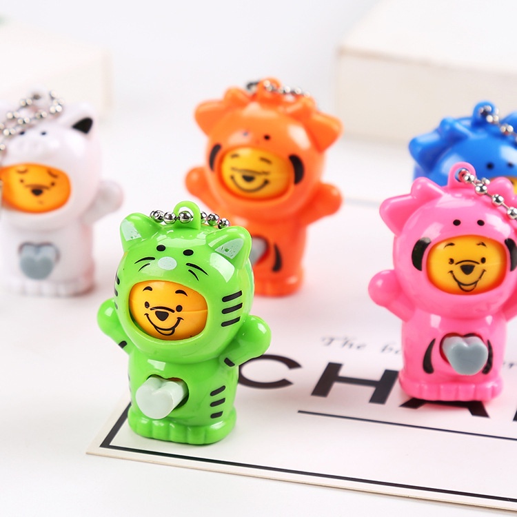 Móc khoá búp bê gấu pooh bấm thay đổi khuôn mặt