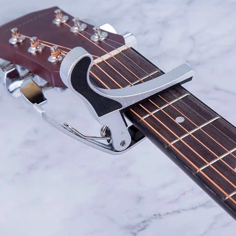 Capo guitar lăn,trượt cho đàn guitar