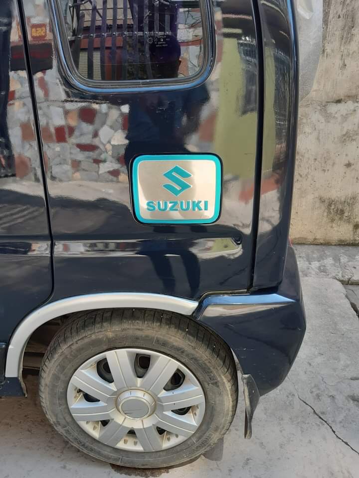Ốp phồng tai xe Suzuki Wagon R+