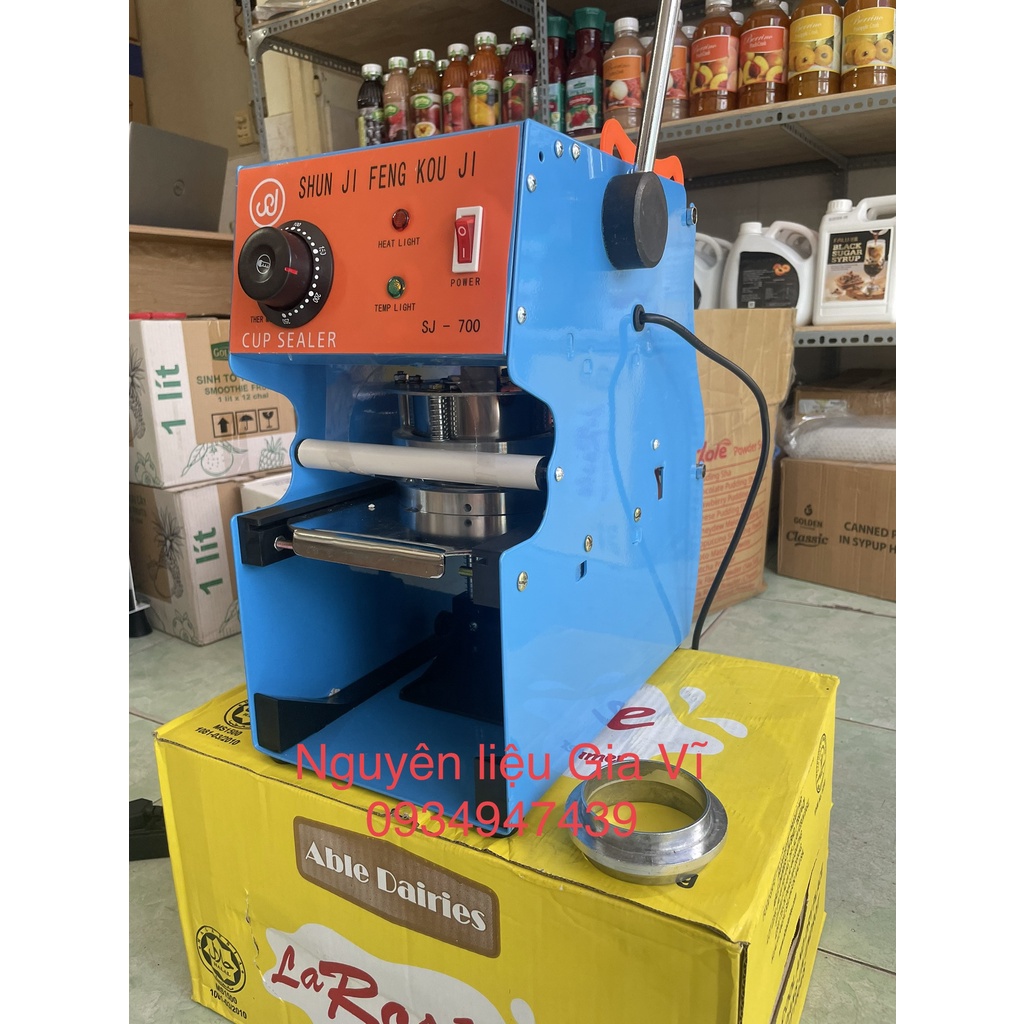 Máy ép miệng ly nhựa SHUNJI