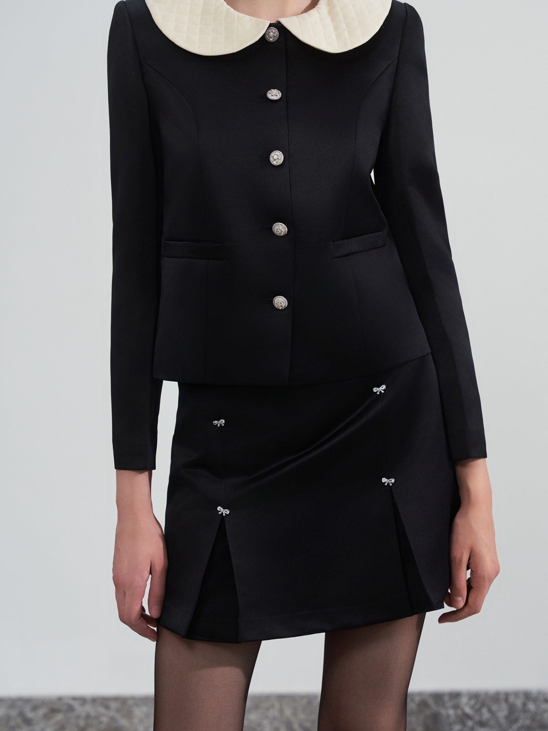 D.CHIC Chân váy A ngắn 4 cúc nơ MS: 381727
