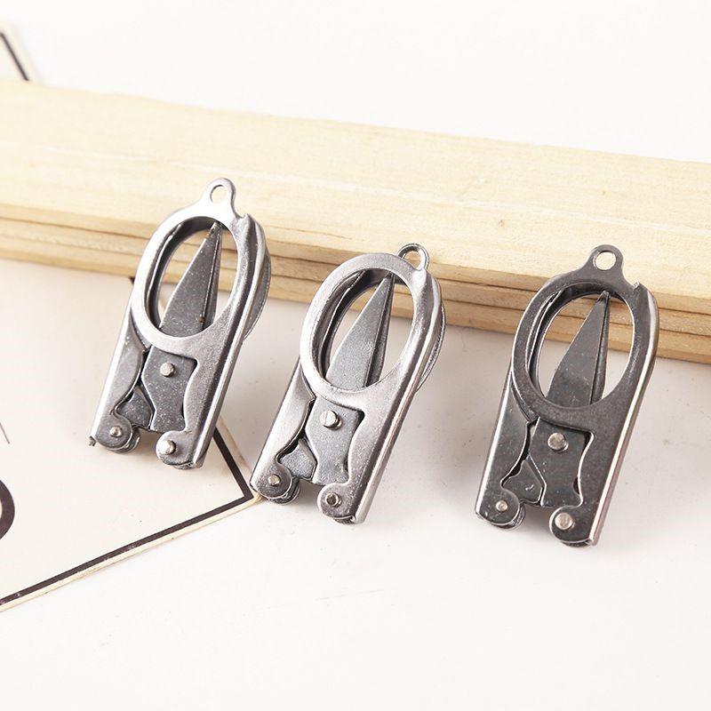 Kéo gấp gọn mini bỏ túi khi đi du lịch