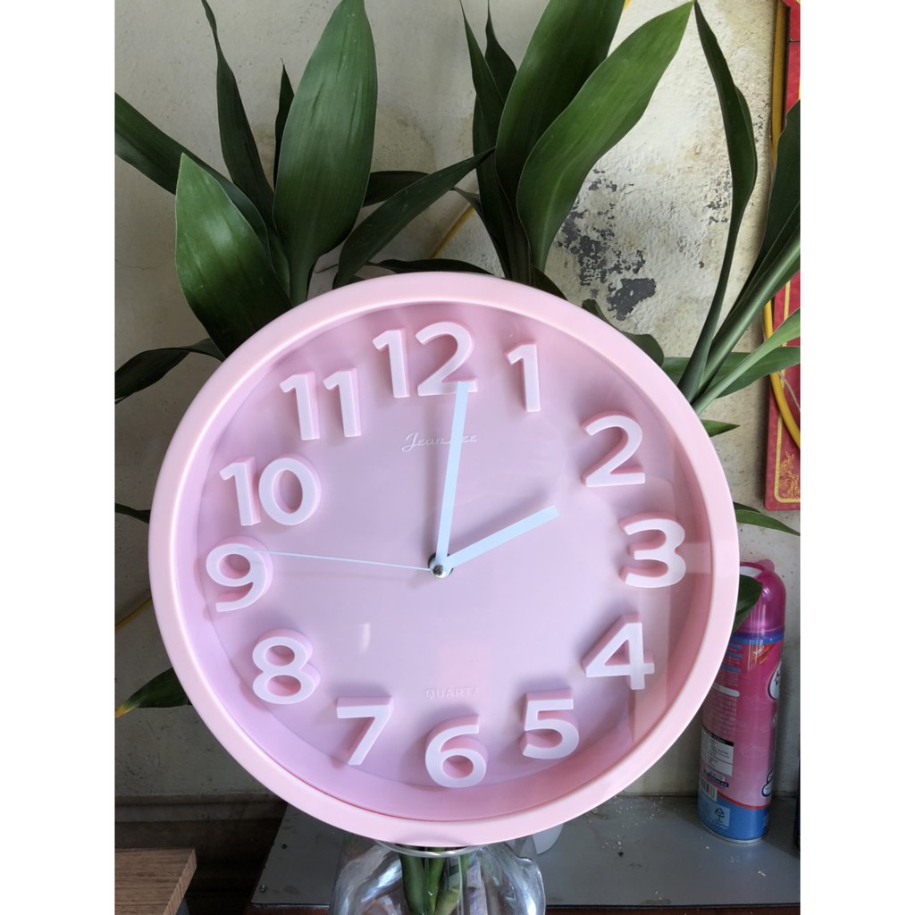 Đồng hồ treo tường kim trôi QUARTZ.