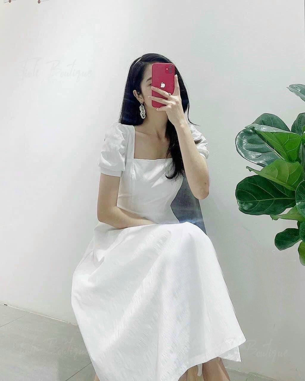 Đầm trắng cổ vuông nơ sau