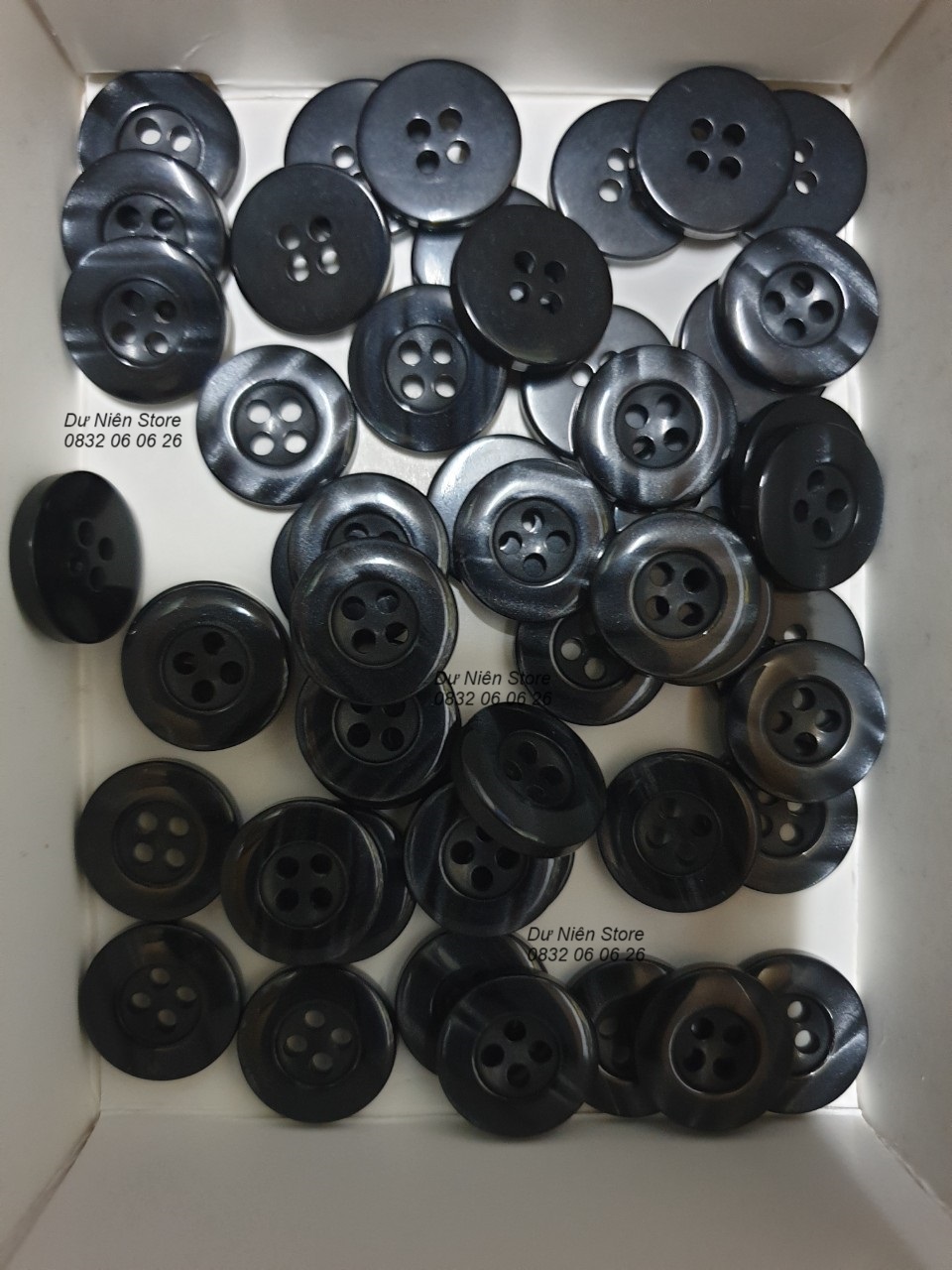 Black Glossy Trouser Buttons Pack of 50 Buttons.