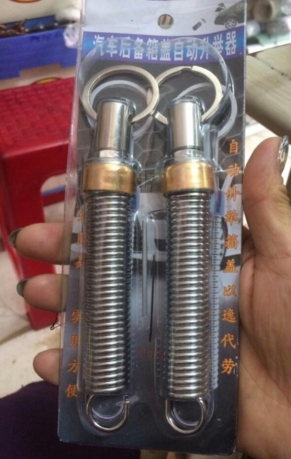 Lò xo mở cốp xe ô tô tự động  bộ 2 chiếc