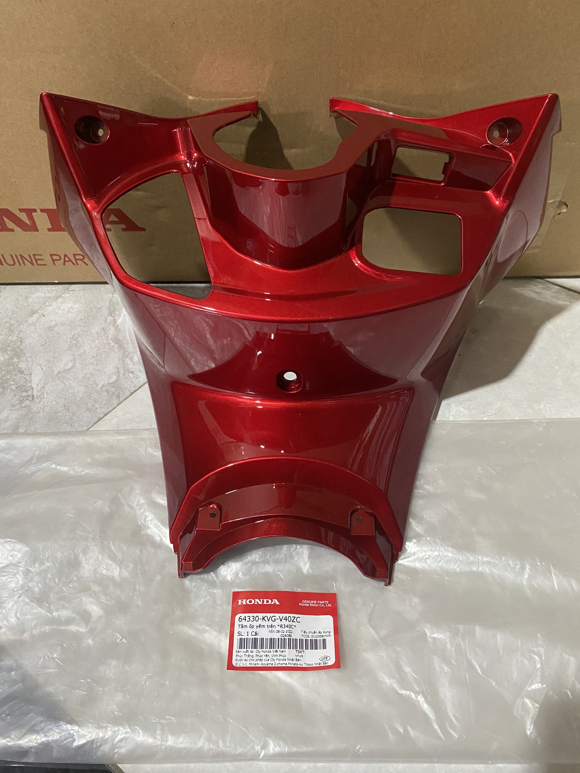 Tấm ốp yếm trên *R340C*(ốp ổ khóa) air blade béo 2011 ( 64330KVGV40ZC)