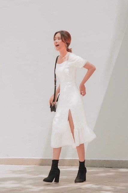 Đầm trắng đuôi cá xẻ tà