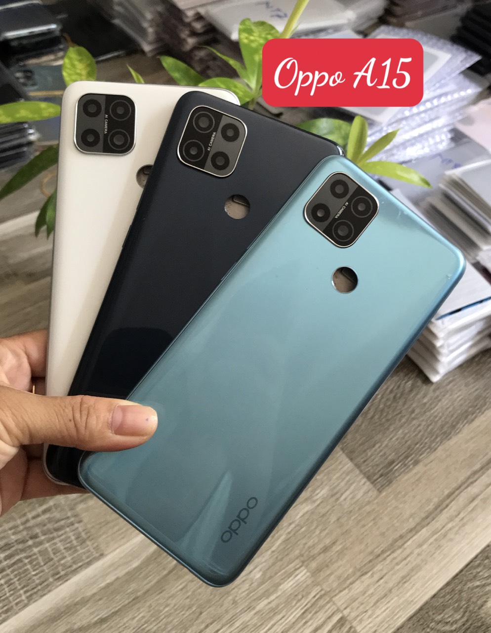 Bộ vỏ oppo A15 / A15s zin  (gồm lưng ,xương ,phím bấm,kính camera )