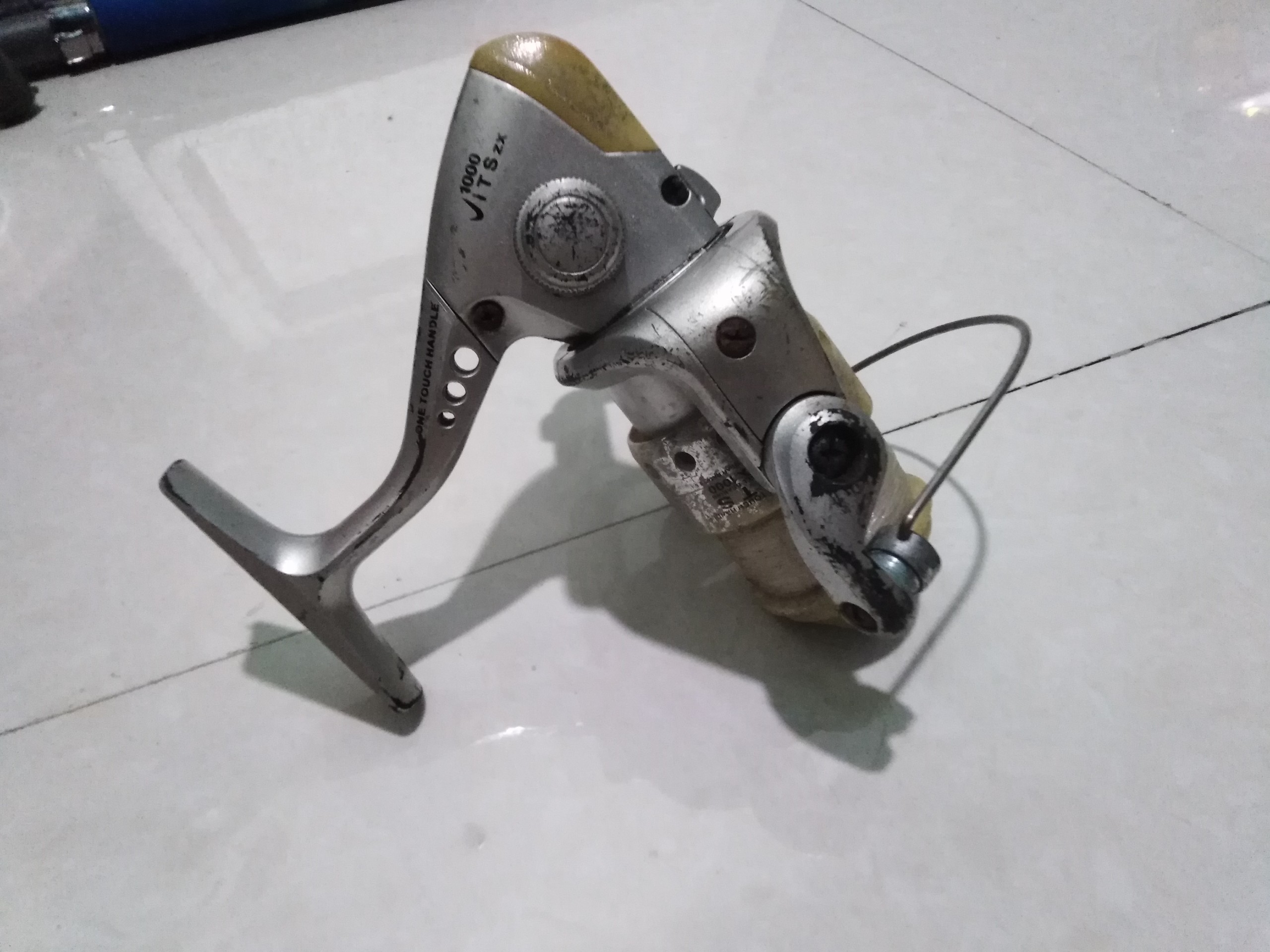 Máy câu bãi nhật one touch handle 1000