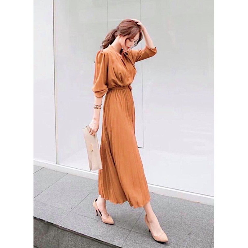 Đầm vàng đồng cổ trụ tùng dập li