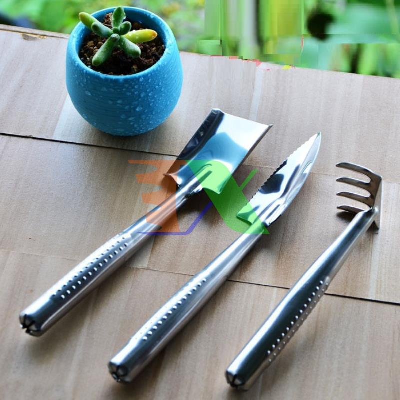 Bộ dụng cụ làm vườn 3 món thép trắng TXE-3IN Bộ xẻng 3 món Inox  Xẻng 3 trong một ( Gồm, 1 xẻng, 1 xúc, 1 cào, sử dụng tiện lợi, kiểu dáng đẹp, nhỏ gọn)