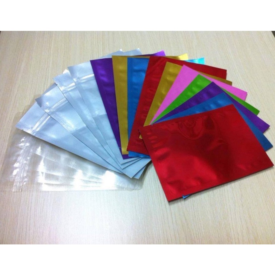 TÚI ZIP 2 MẶT MÀU ĐỎ THẤM,BÁN THEO KÝ