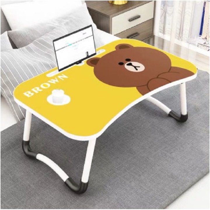 Folding study table compact has slot for iPad