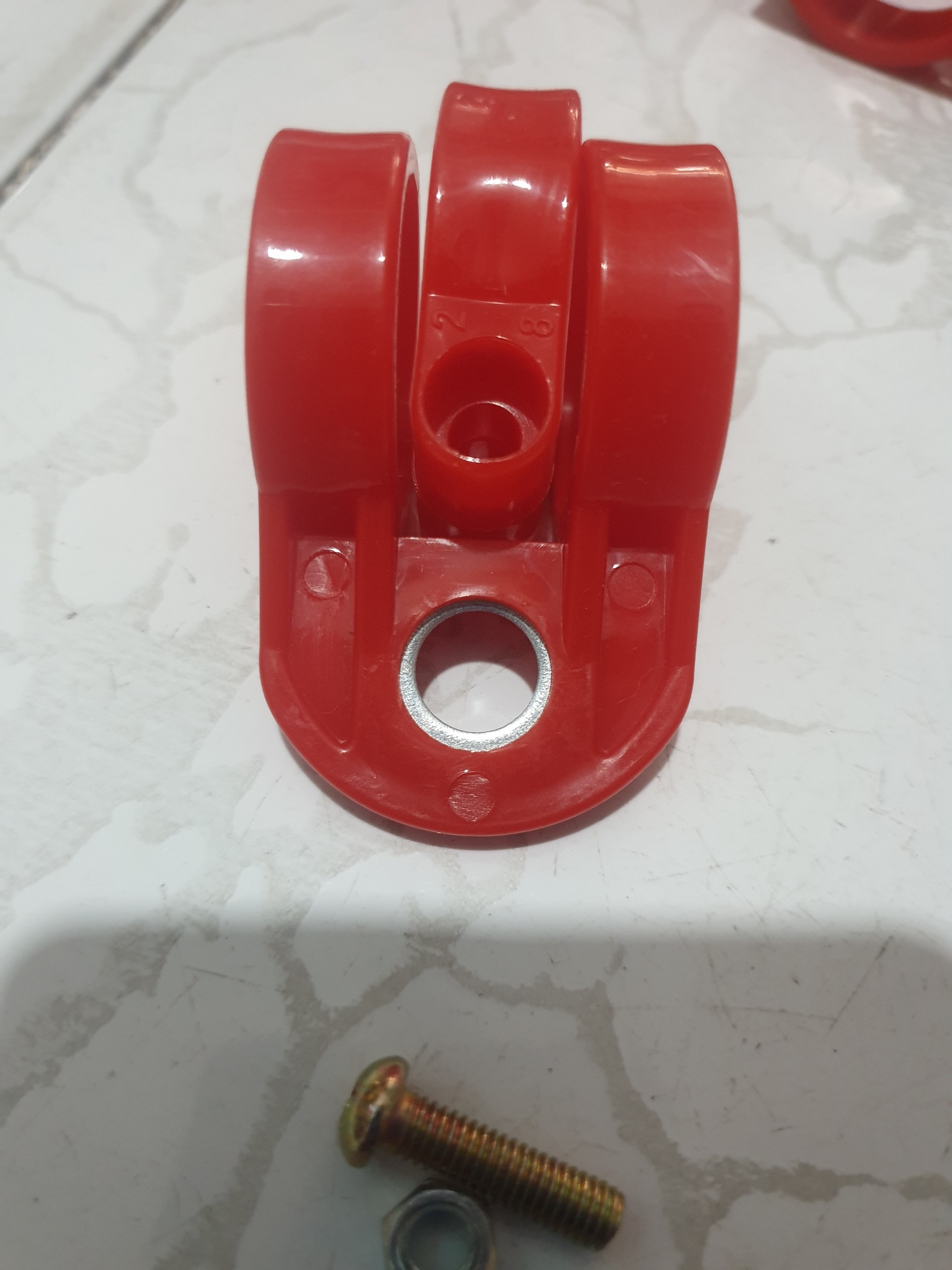 (2 CÁI- NHỰA) MÓC DÂY ĐEO MÁY CẮT CỎ. phi 28mm - 26mm